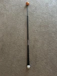 Orange Whip Full-sized Golf Swing Trainer Aid. Fixed Price $75.00.