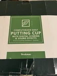 Brookstone Putting Cup With Original Box Model #275891. Fixed Price $9.95.