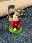 Christmas Ornament Resin Santa Hitting Golf Ball Avon OH6350. Fixed Price $5.99.