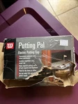Wilson Model W355 Portable Golf Putting Pal Automatic Ball Return Trainer. Fixed Price $20.00.