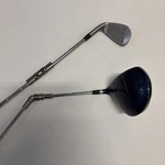 Medicus Dual Hinge Golf Training Set 10.5 Degree Driver + 7 Iron Swing Trainer. Fixed Price $69.00.