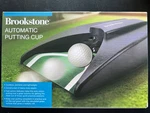 Brookstone Automatic Return Putting Cup. Fixed Price $18.99.