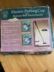 Vintage Putting System - Returns Ball Electronically Nib Dennco Good Sports. Fixed Price $34.95.